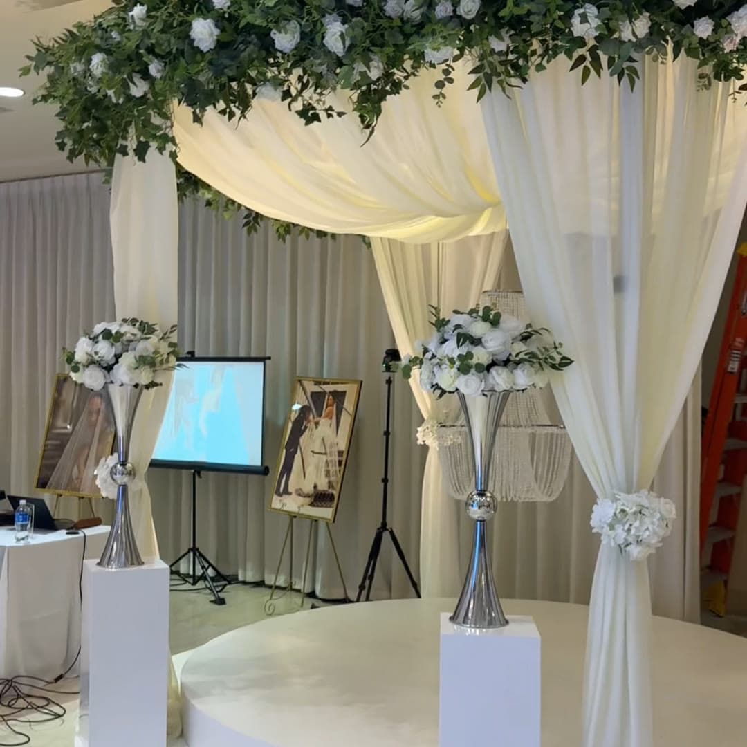Draped fabric canopy ceremony install