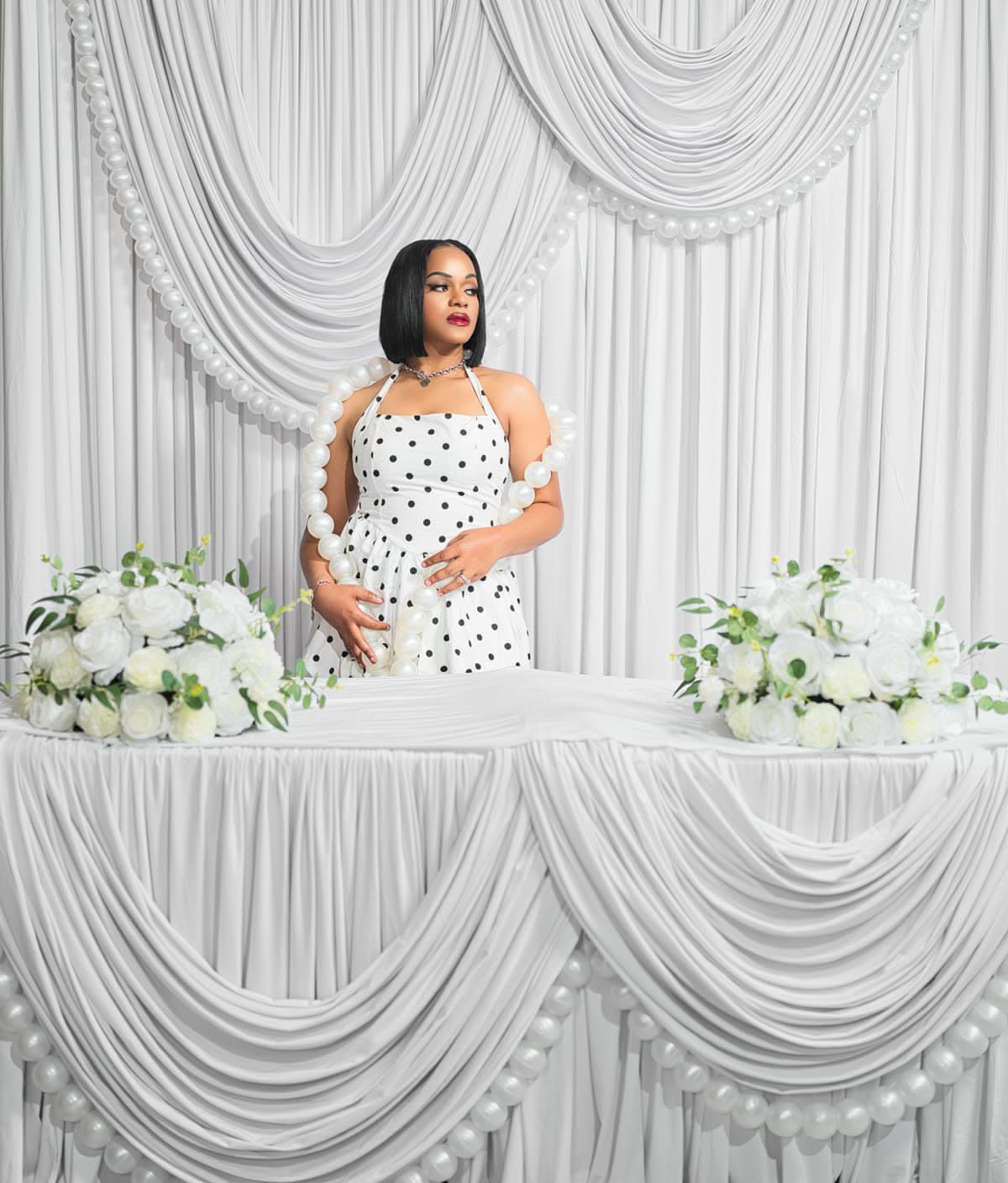 Sheer white drape and pearls