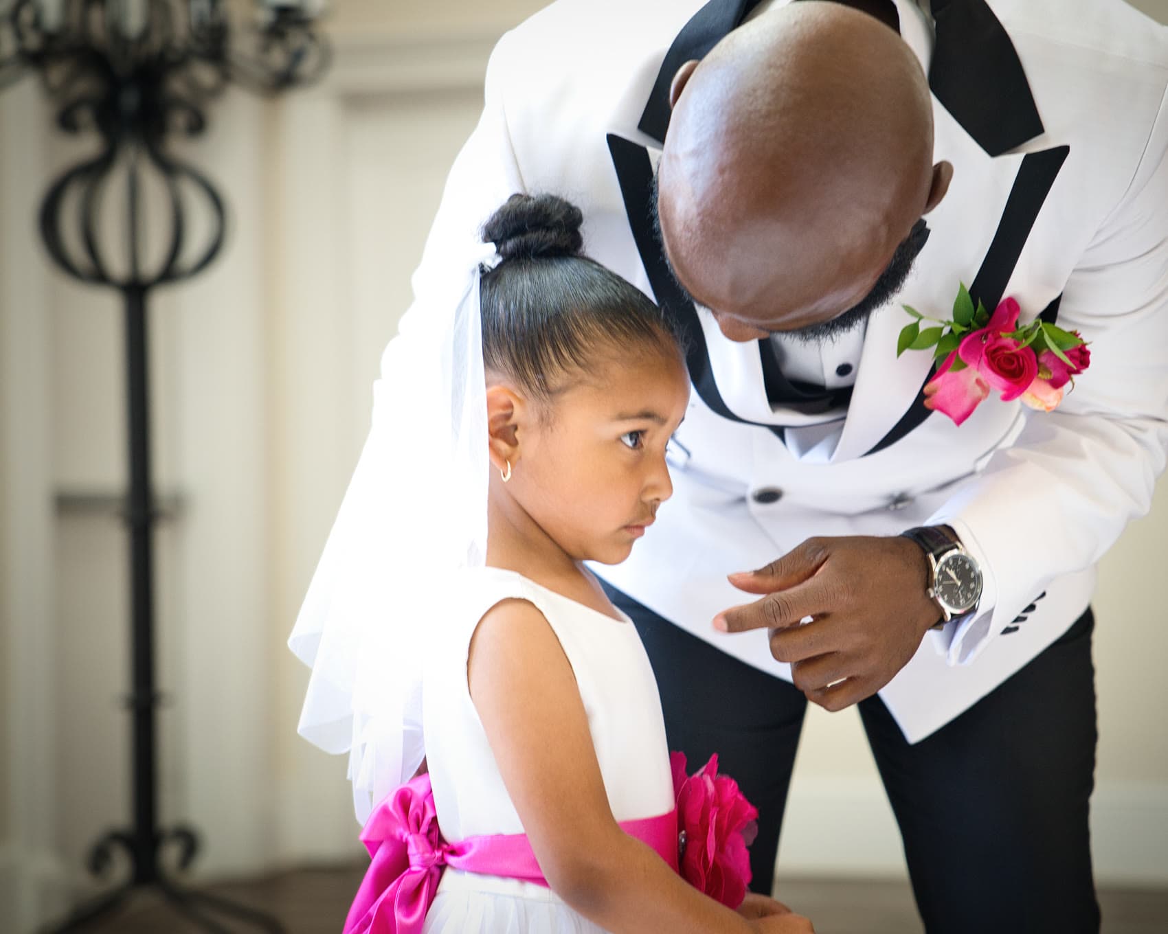 Groom and flower girl before the ceremony