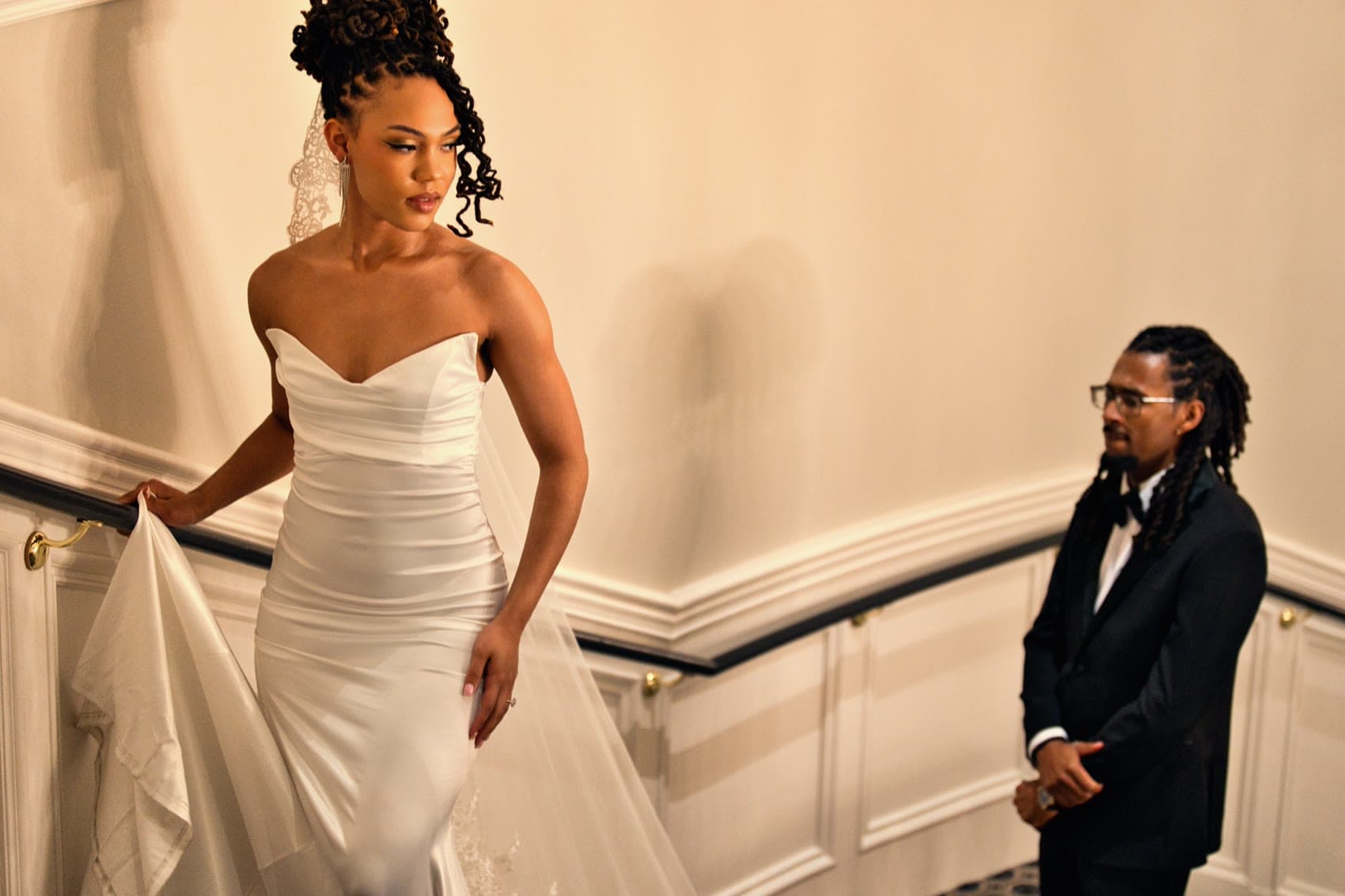 Bride on the staircase before her first look